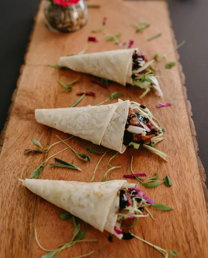 Our stomachs are forever grumbling for gilscatering slow-roasted duck moo shu pancakes! A trending food style for weddings this year