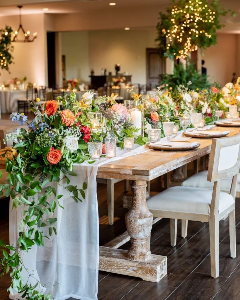 Stephanie + Eric’s bright floral-filled wedding at thelaureltexas⁠ has stolen our hearts. This springtime wildflower reception was covered head to